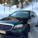 Mercedes E Class that we use for our services and is located on the snow in this image