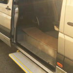 Photo of the step that gives a hand to get into the car that has our Mercedes Benz Sprinter Mobility 33 used by us for our services
